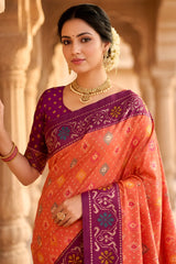 Beauteous Orange Patola Silk Saree with Denouement Blouse Piece