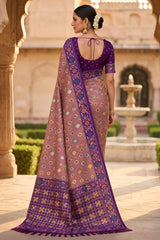 Inimitable Pink Patola Silk Saree with Delectable Blouse Piece