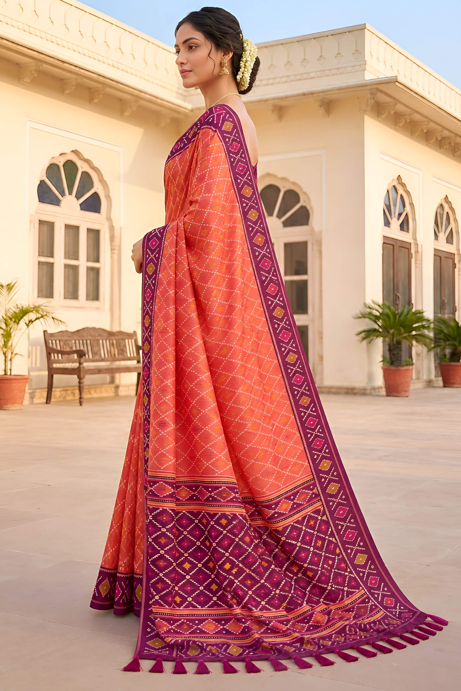 Glorious Orange Patola Silk Saree with Gleaming Blouse Piece