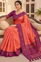 Glorious Orange Patola Silk Saree with Gleaming Blouse Piece