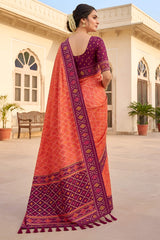 Glorious Orange Patola Silk Saree with Gleaming Blouse Piece