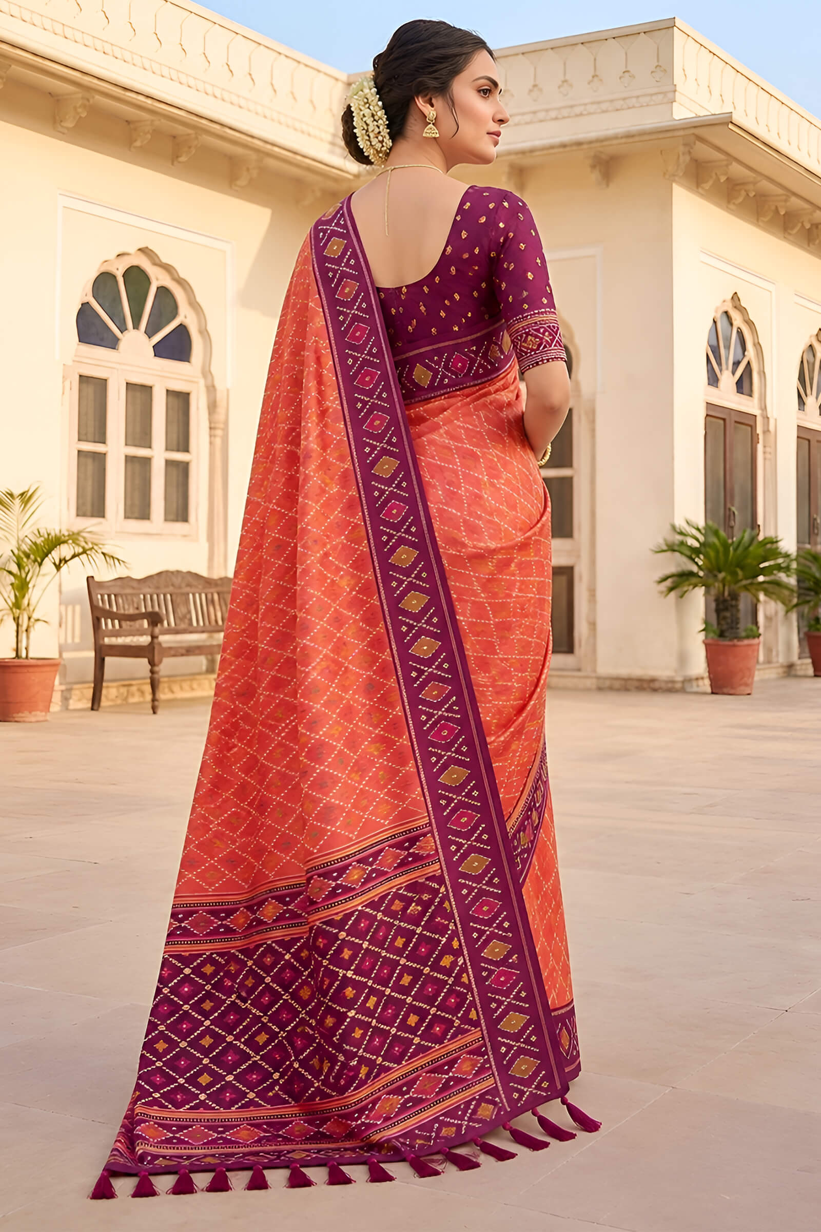 Glorious Orange Patola Silk Saree with Gleaming Blouse Piece