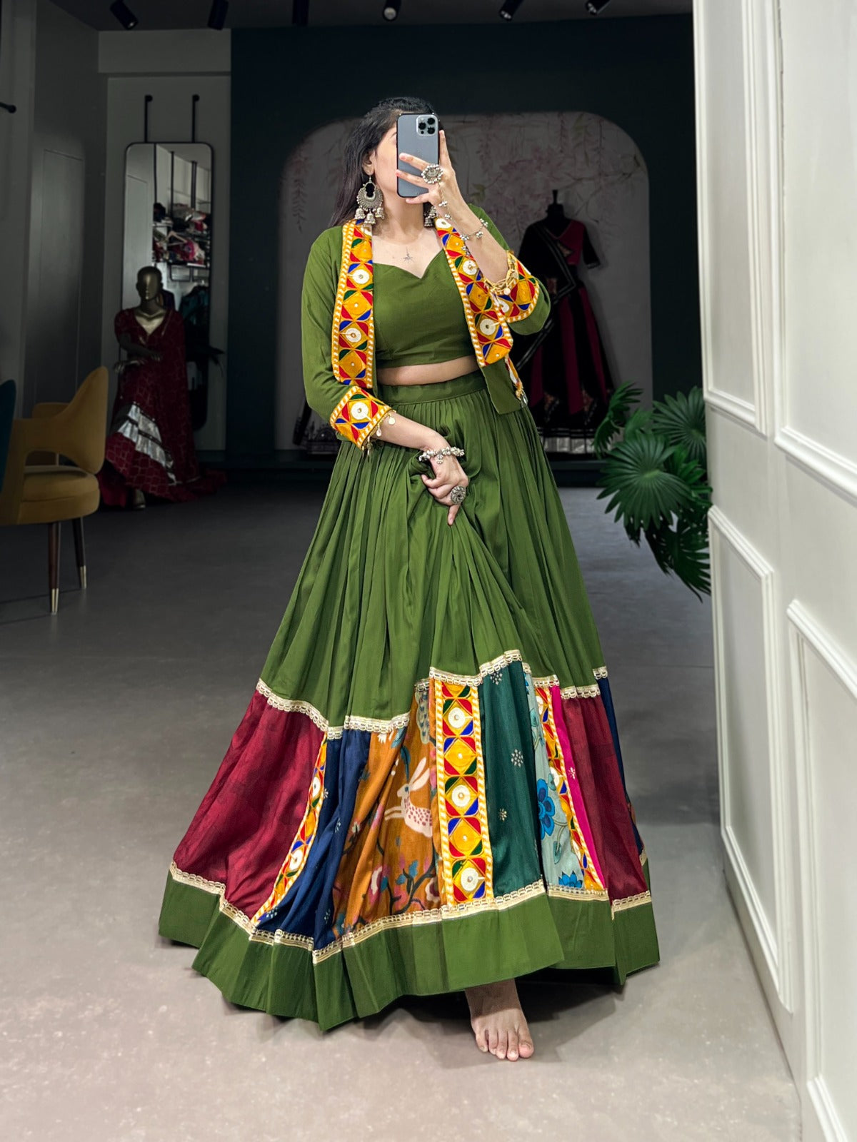 Vibrant and Mesmerizing Mahendi Green Navratri Rayon Lehenga Choli