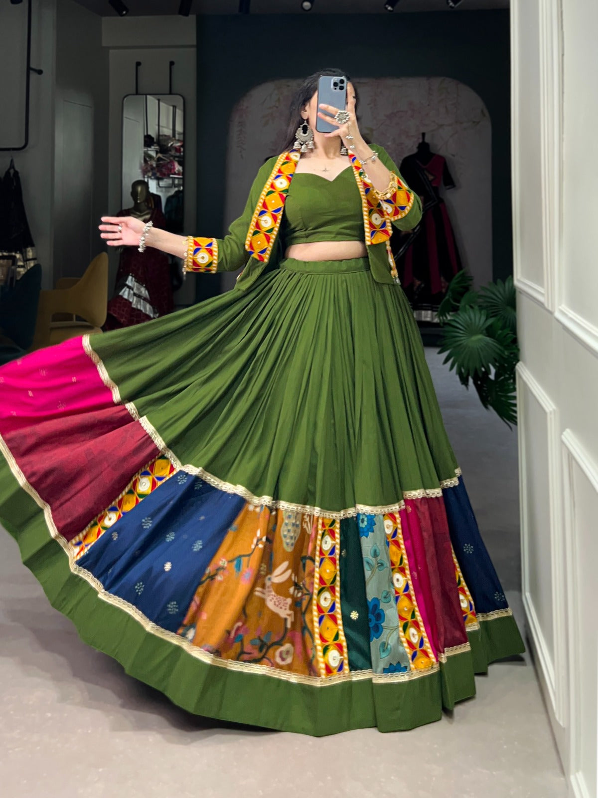 Vibrant and Mesmerizing Mahendi Green Navratri Rayon Lehenga Choli