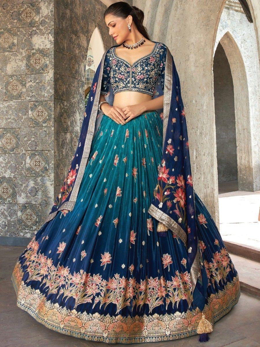 Outstanding Blue Zari Woven Silk Wedding Wear Lehenga Choli Set