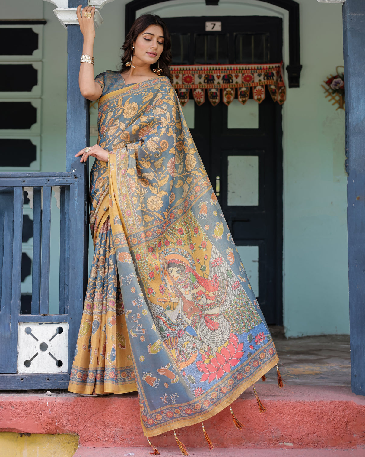 Mustard blue handloom cotton saree with mudra motifs goddess saraswati pallu