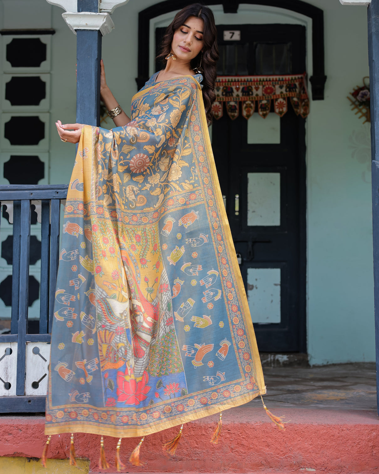 Mustard blue handloom cotton saree with mudra motifs goddess saraswati pallu