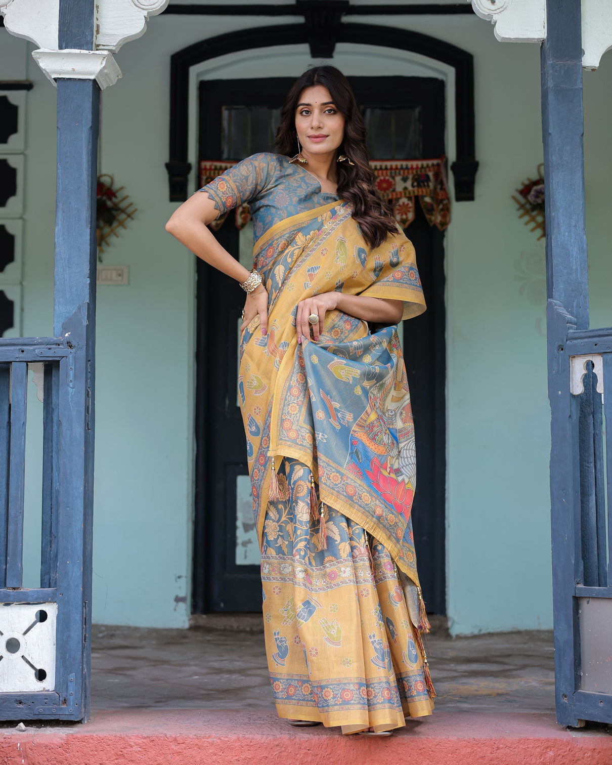Mustard blue handloom cotton saree with mudra motifs goddess saraswati pallu