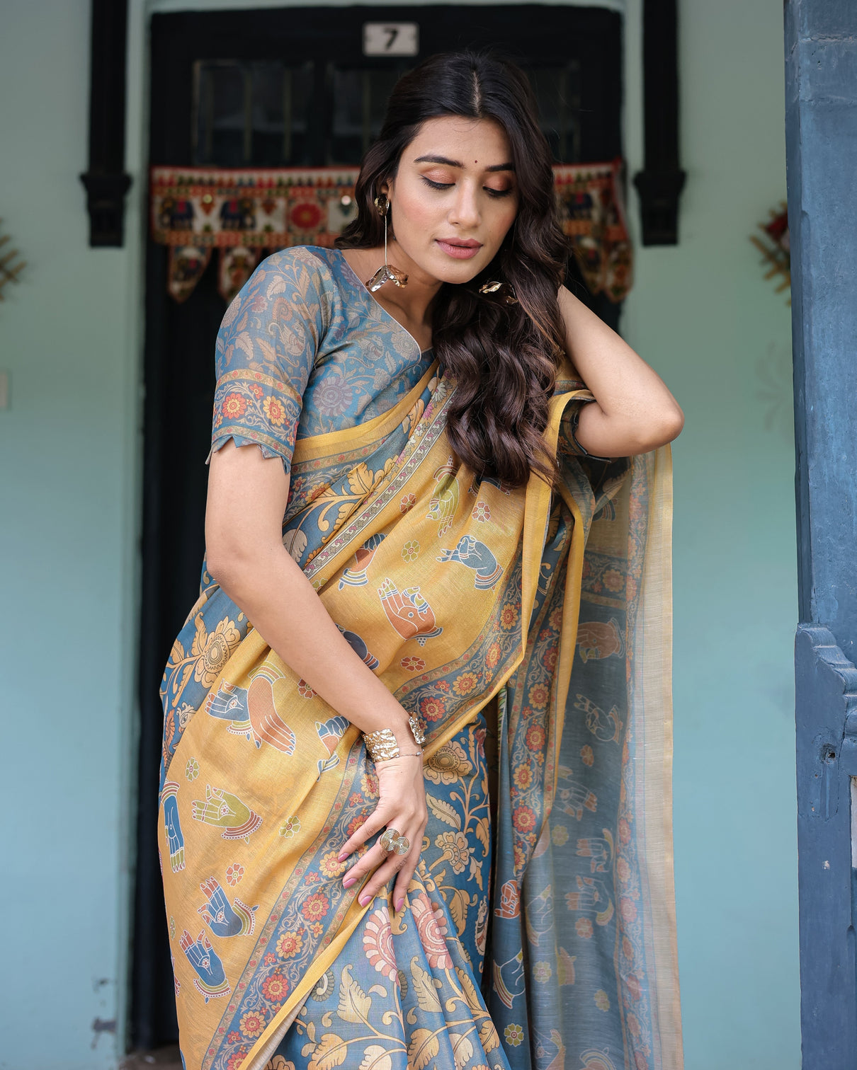 Mustard blue handloom cotton saree with mudra motifs goddess saraswati pallu