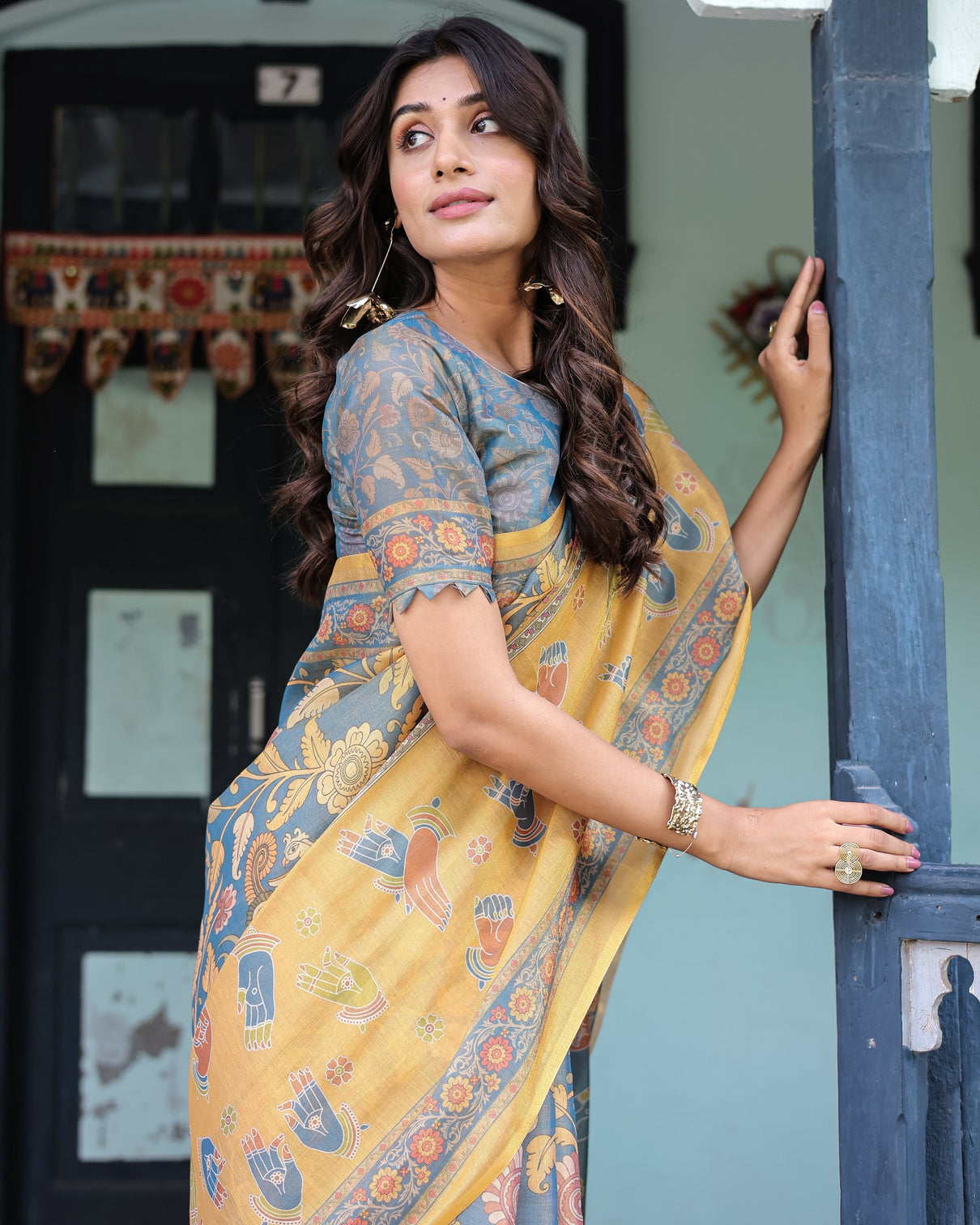 Mustard blue handloom cotton saree with mudra motifs goddess saraswati pallu