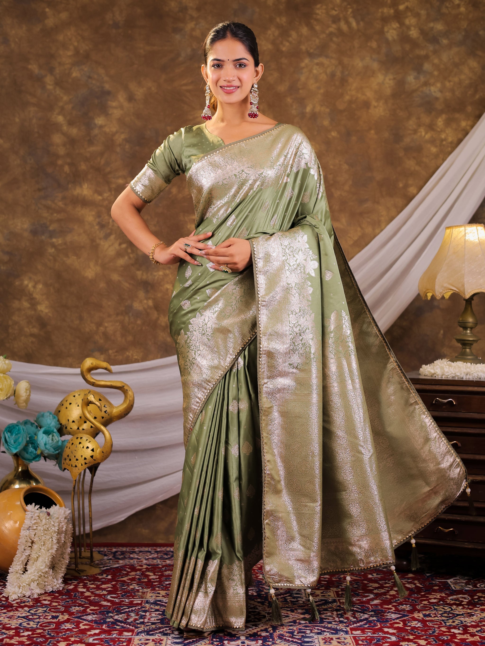 Sage Green Kanjivaram Banarasi Satin Silk Saree with Silver Zari Weaving, Floral Woven Border, Rich Designer Pallu & Tassels