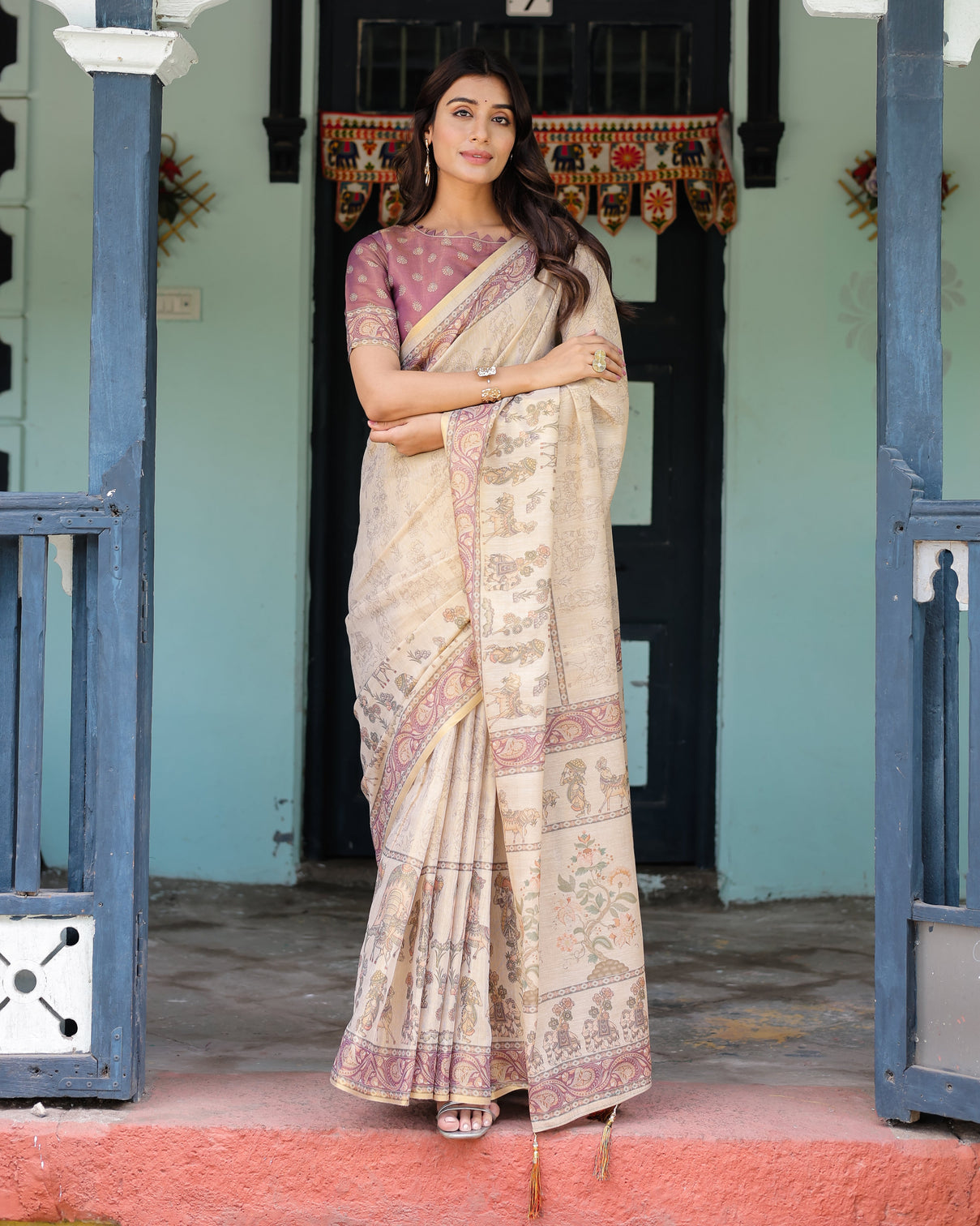 Beige mauve handloom cotton saree with subtle ramayan print and heritage motif pallu