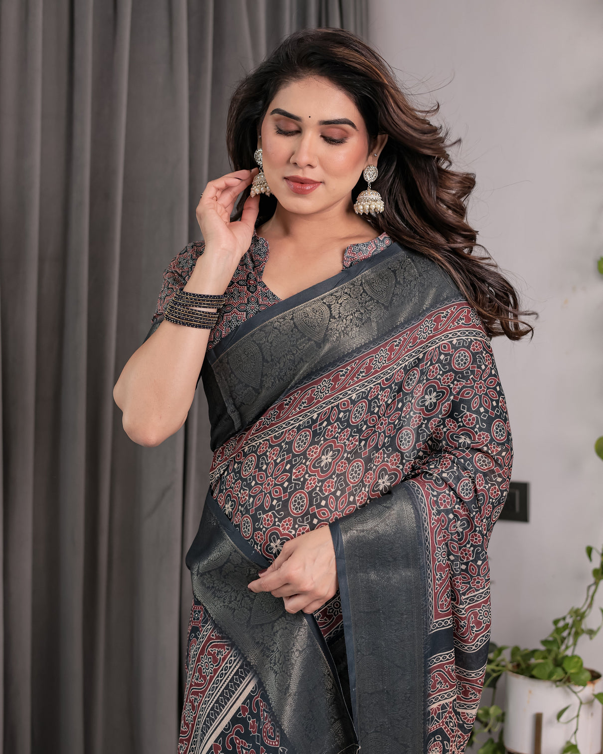 Heritage charcoal black handloom linen saree with ajrakh inspired print