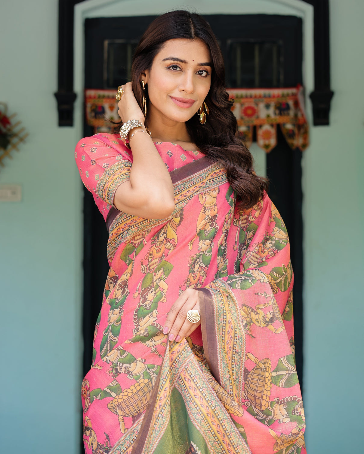 Coral pink handloom cotton saree with traditional folk procession print classical dance pallu