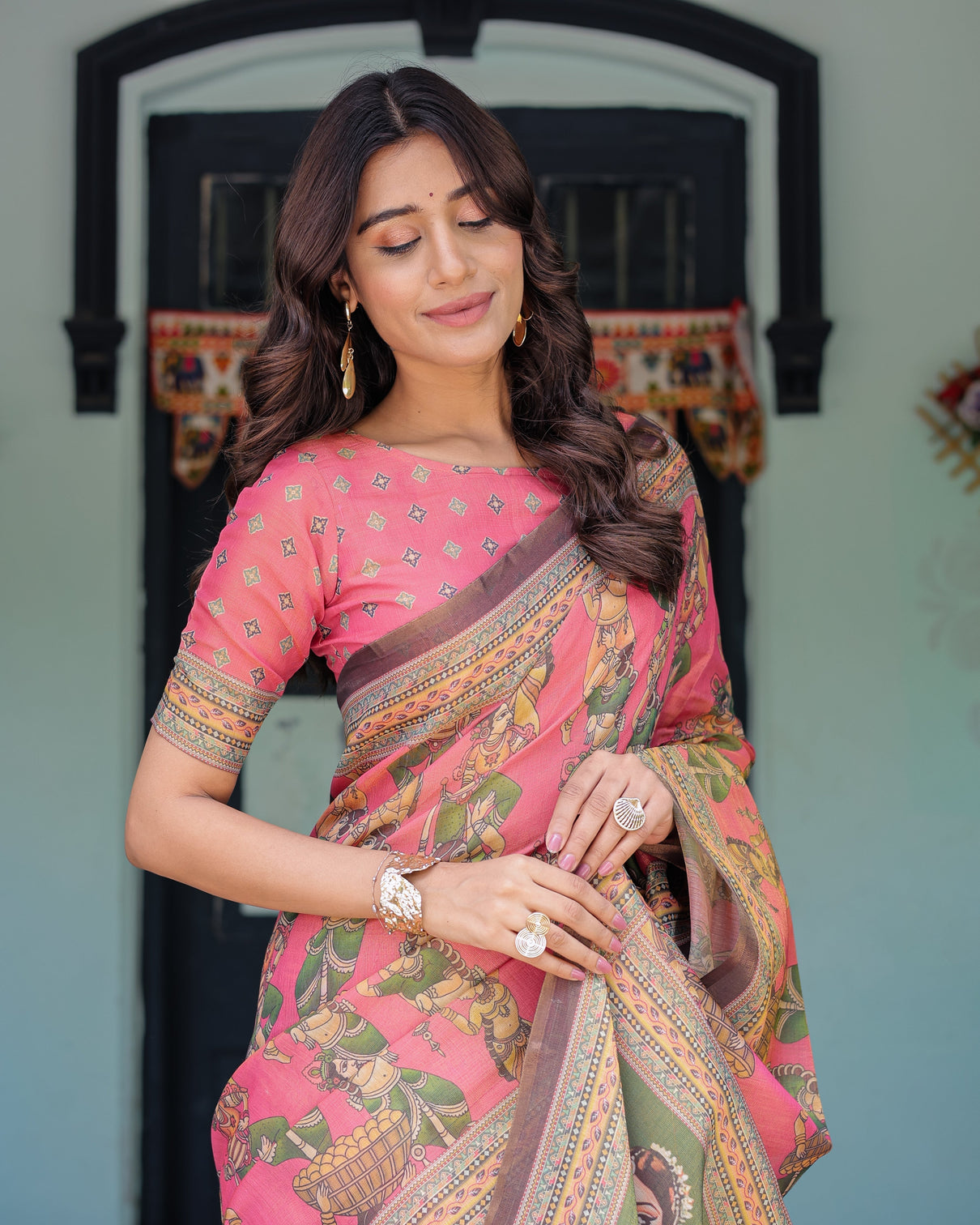 Coral pink handloom cotton saree with traditional folk procession print classical dance pallu