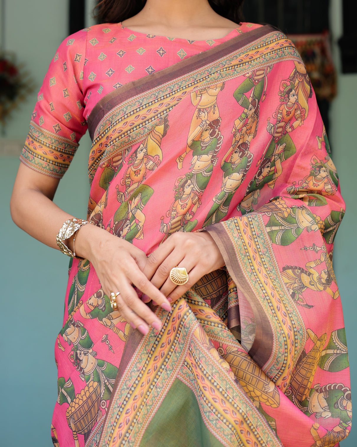 Coral pink handloom cotton saree with traditional folk procession print classical dance pallu
