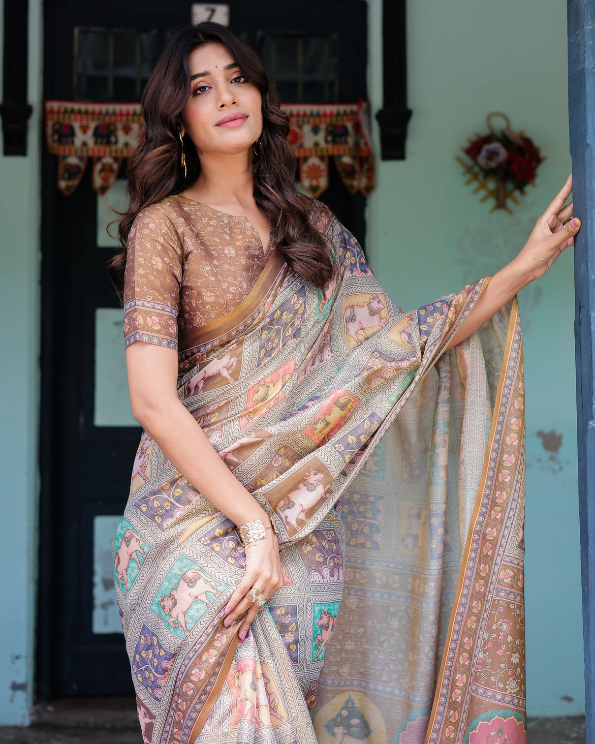 Coffee brown handloom cotton saree with classical art sacred cow pallu