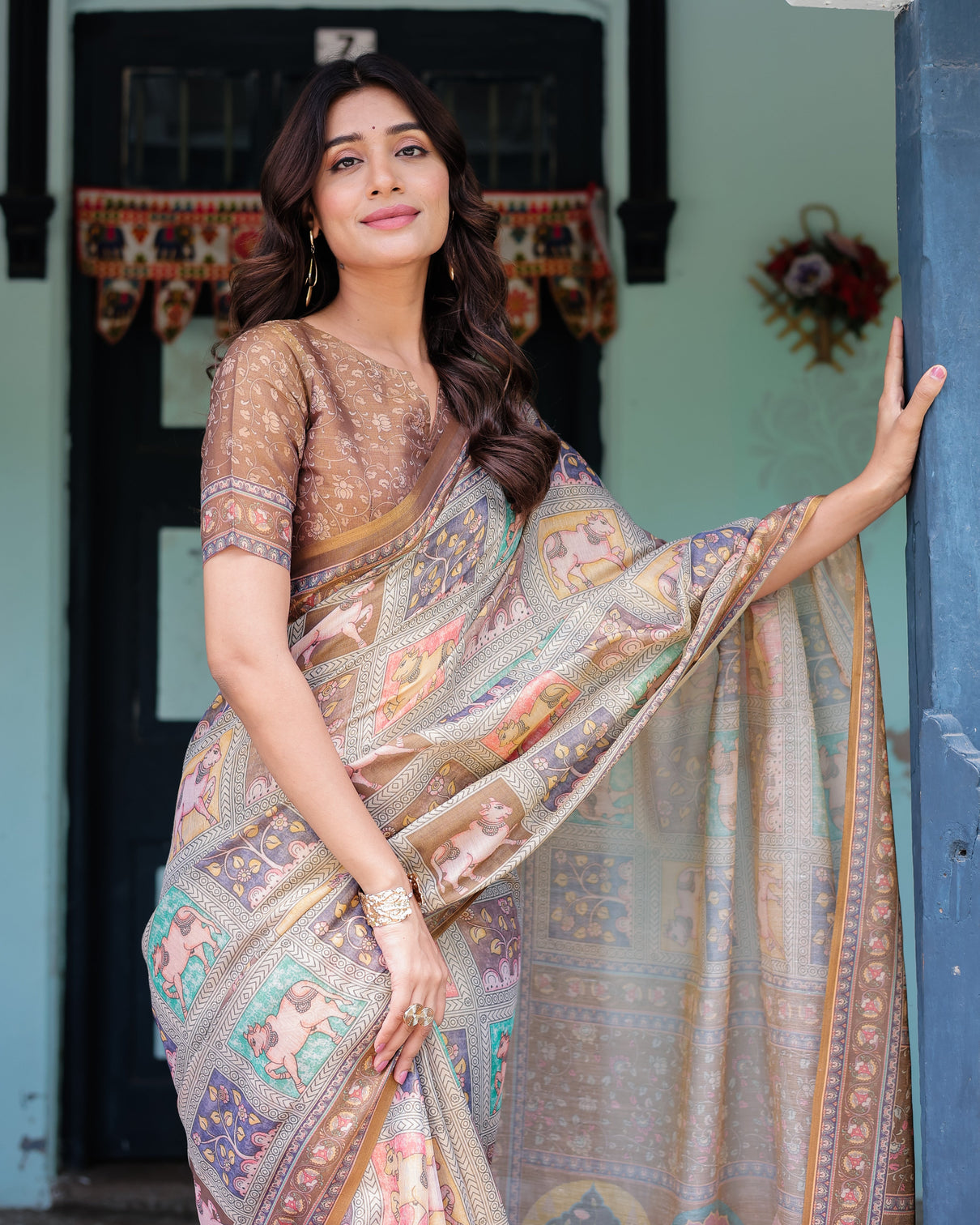 Coffee brown handloom cotton saree with classical art sacred cow pallu