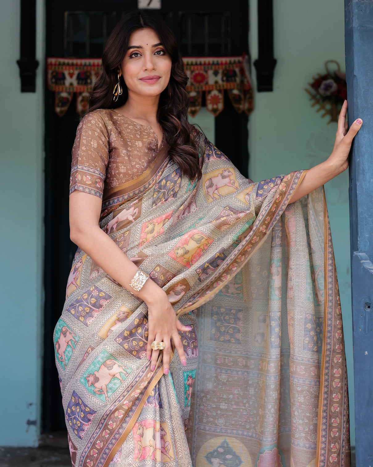 Coffee brown handloom cotton saree with classical art sacred cow pallu