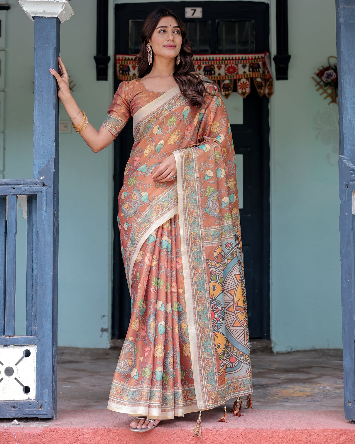 Terracotta handloom cotton saree with blooming floral print madhubani fish pallu mameraa