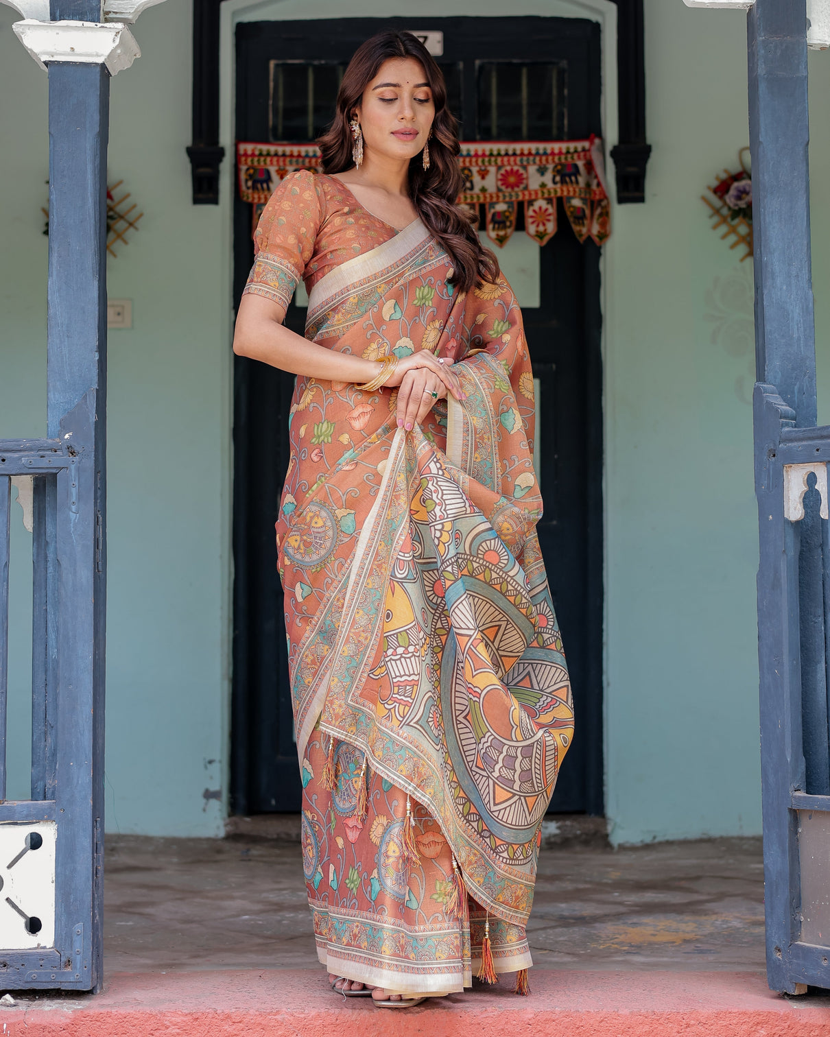 Terracotta handloom cotton saree with blooming floral print madhubani fish pallu