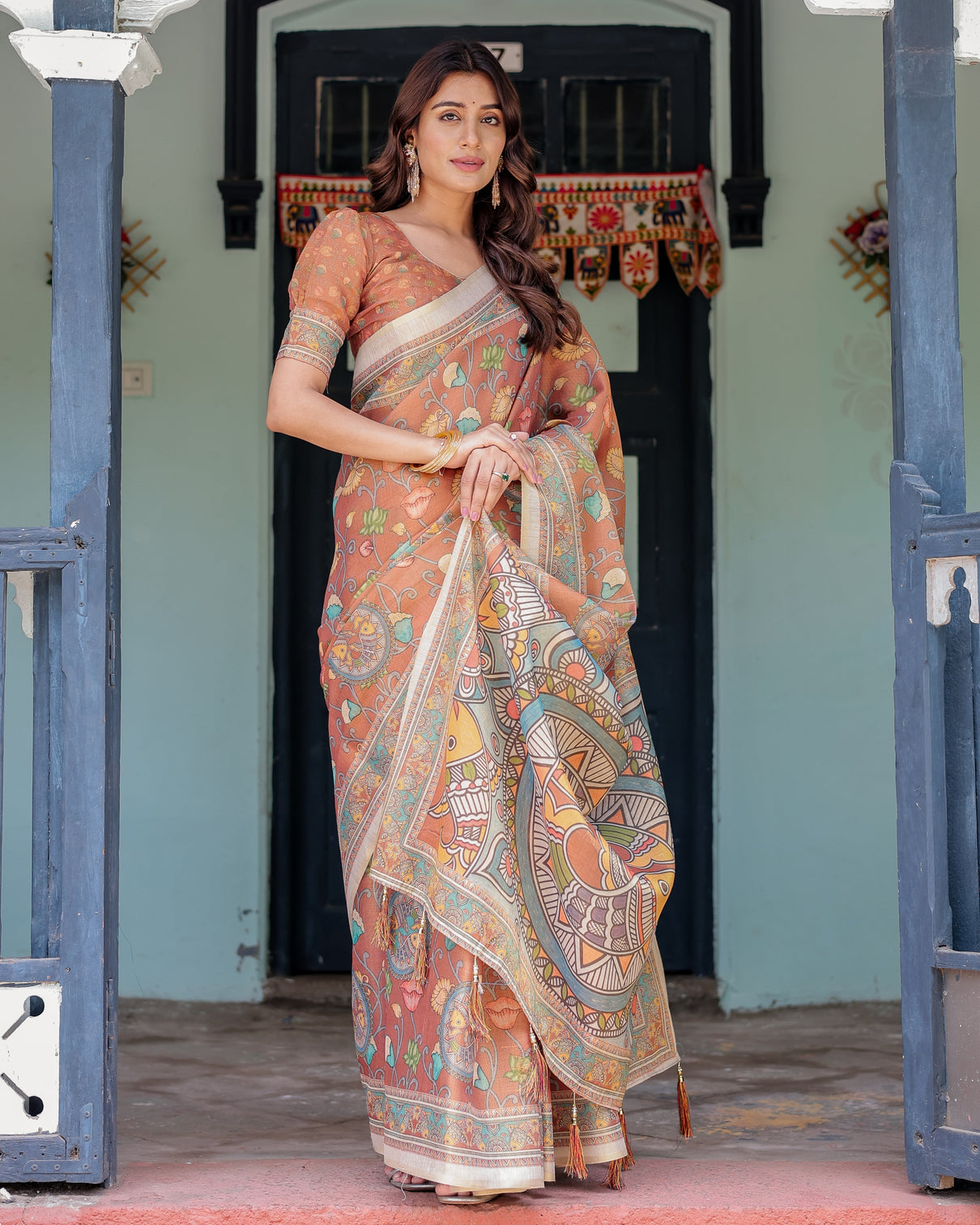 Terracotta handloom cotton saree with blooming floral print madhubani fish pallu