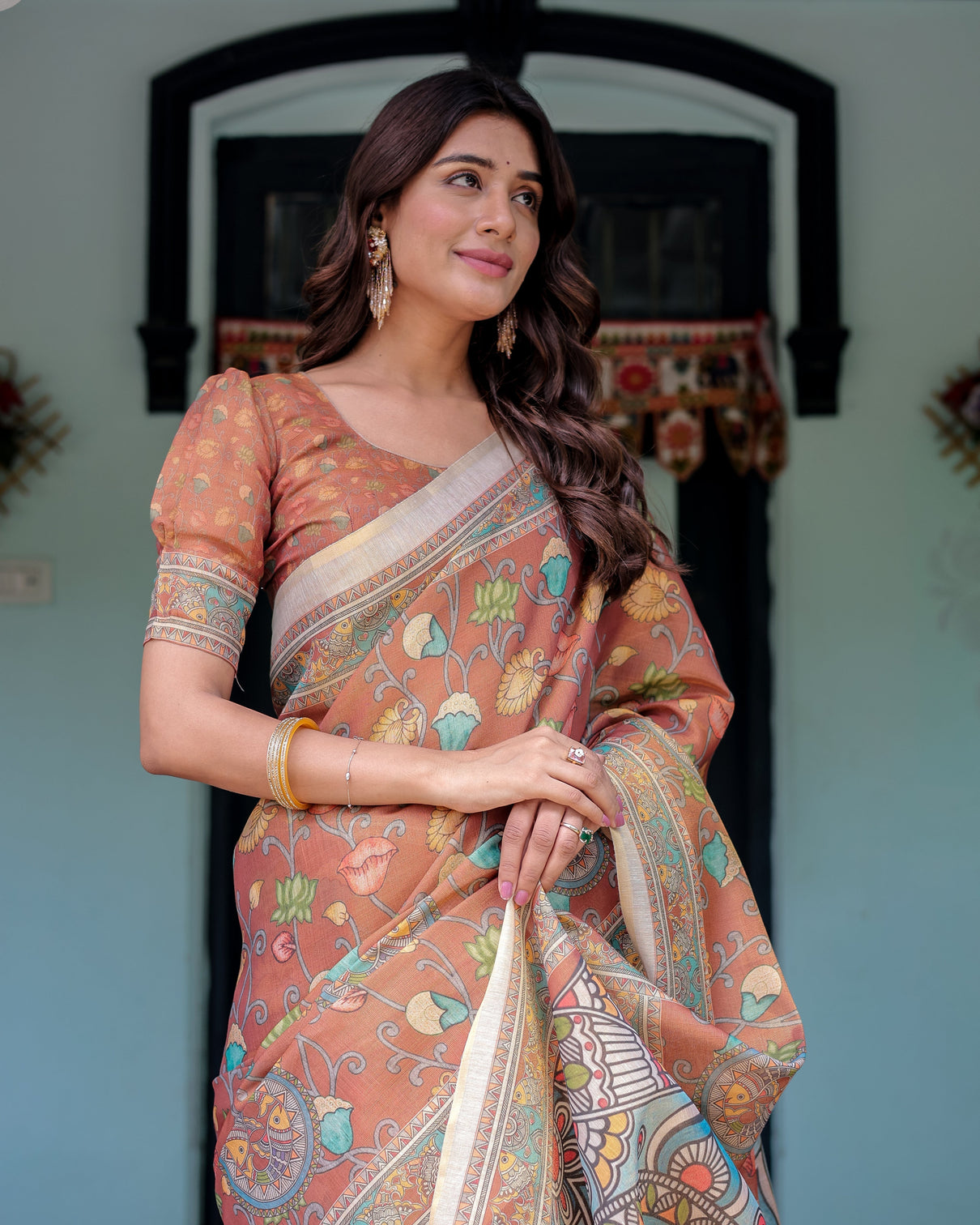 Terracotta handloom cotton saree with blooming floral print madhubani fish pallu