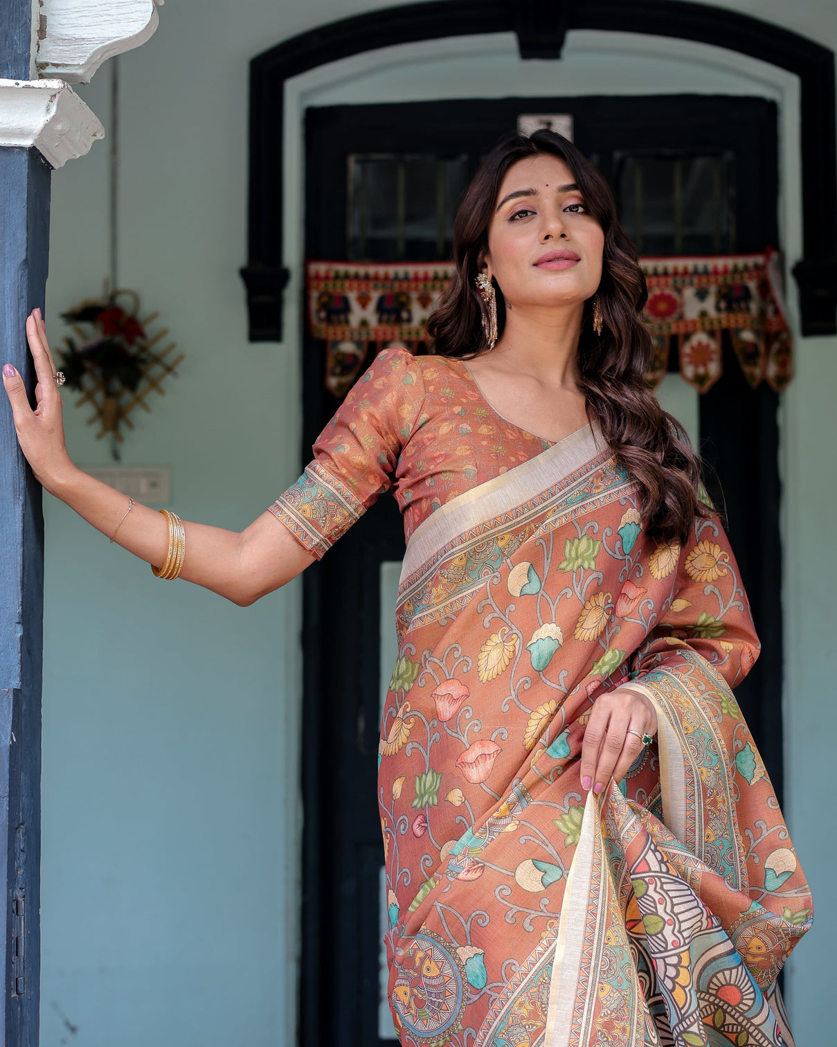 Terracotta handloom cotton saree with blooming floral print madhubani fish pallu