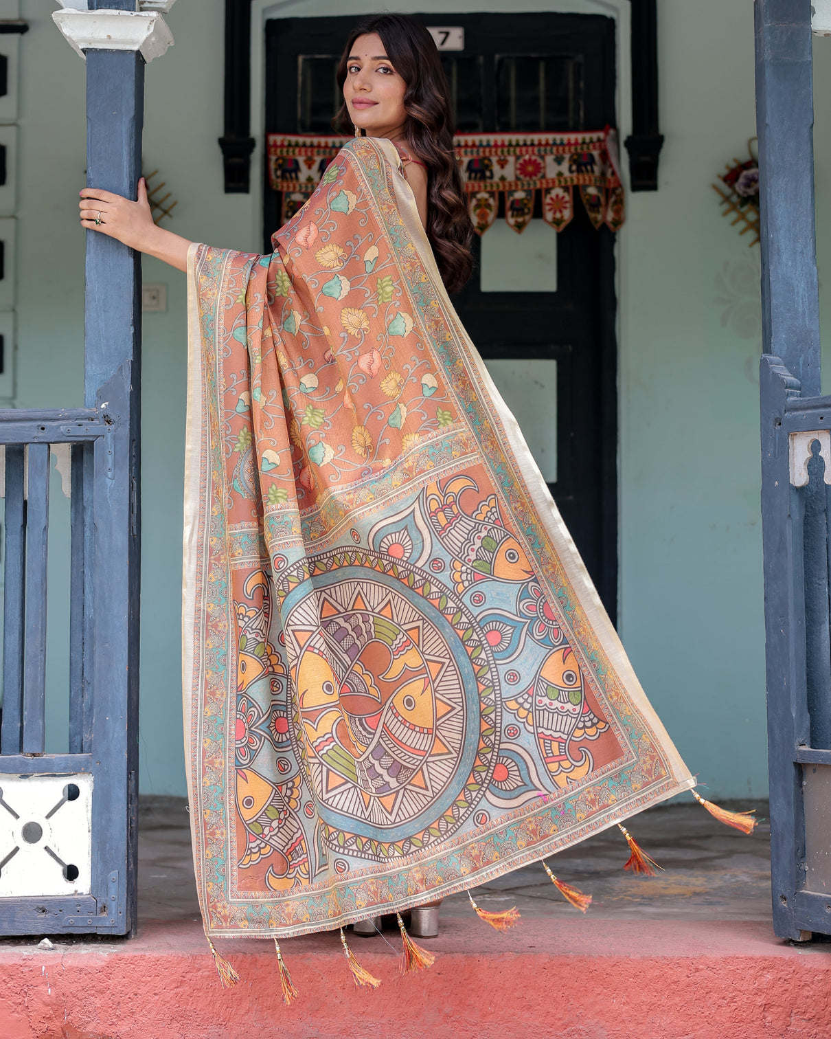 Terracotta handloom cotton saree with blooming floral print madhubani fish pallu