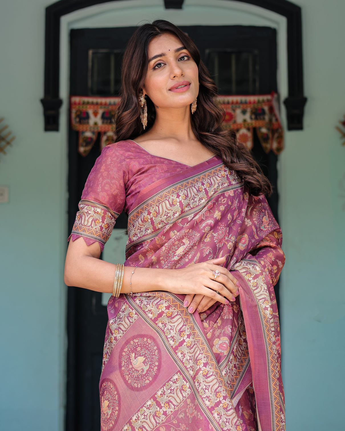 Plum rose handloom cotton saree with floral buttas traditional peacock medallion pallu