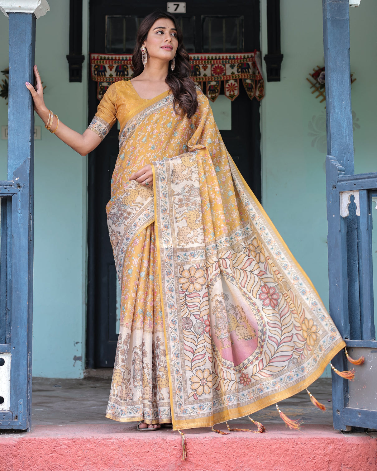 Golden mustard handloom cotton saree with floral vines graceful deer pallu