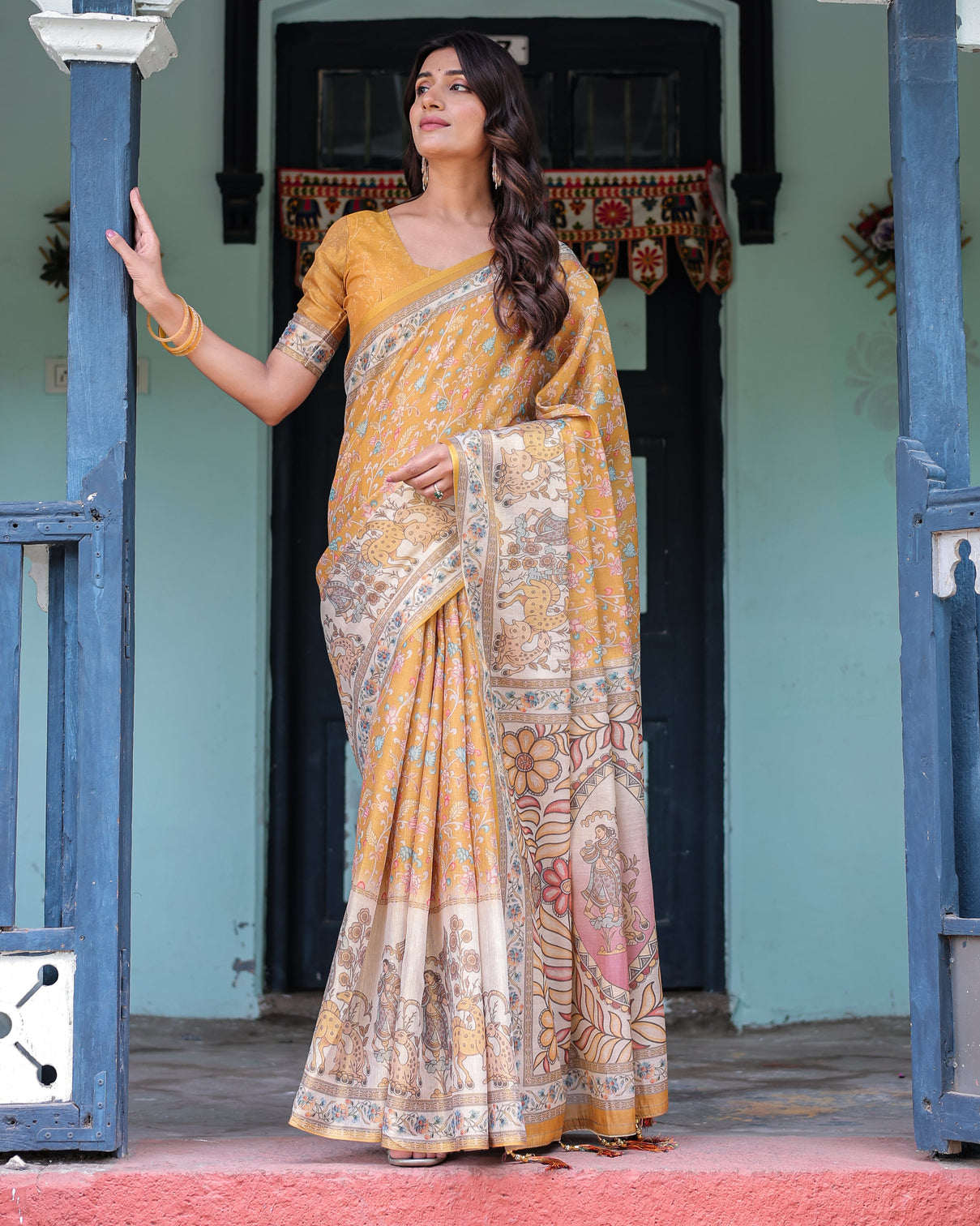 Golden mustard handloom cotton saree with floral vines graceful deer pallu