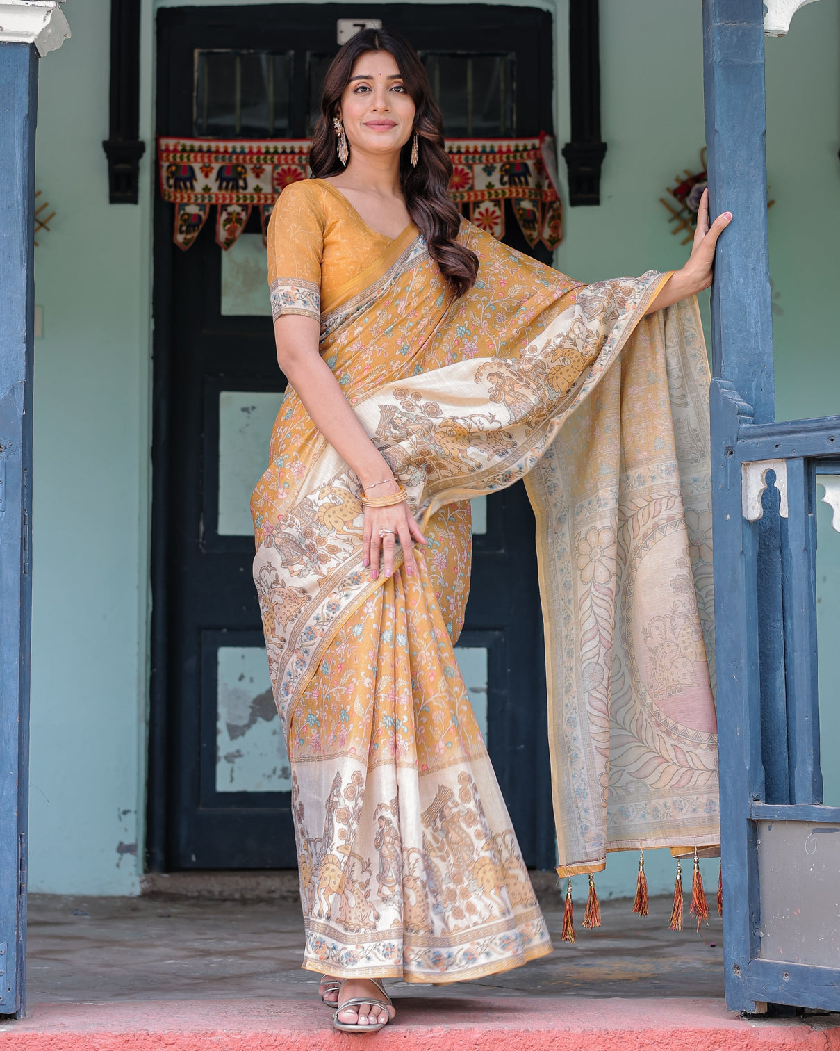 Golden mustard handloom cotton saree with floral vines graceful deer pallu mameraa