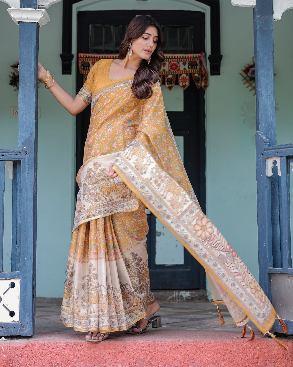 Golden mustard handloom cotton saree with floral vines graceful deer pallu