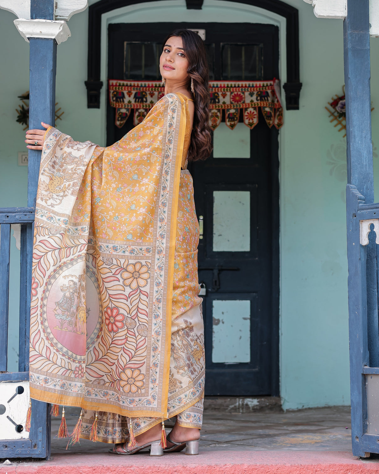 Golden mustard handloom cotton saree with floral vines graceful deer pallu