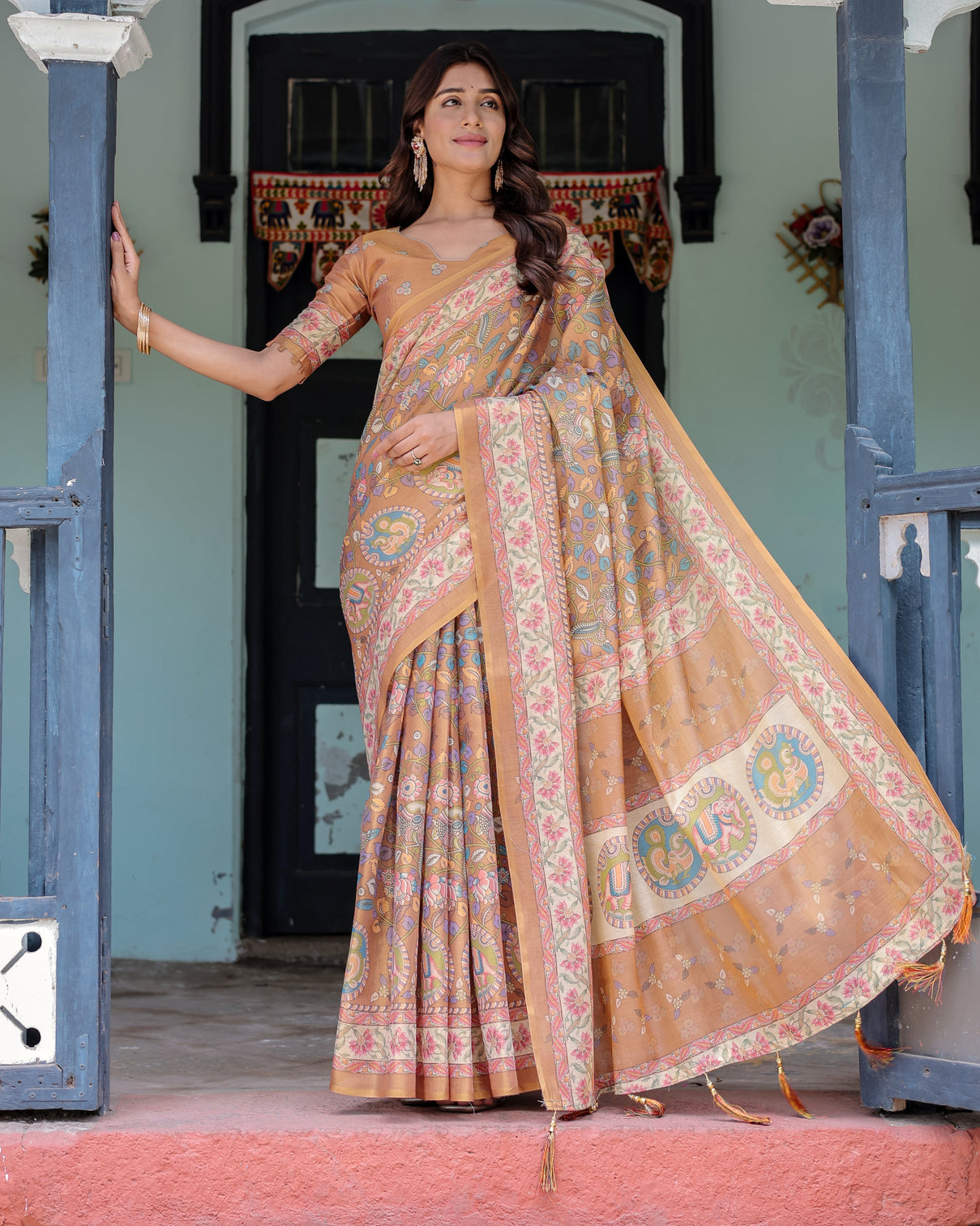 Terracotta peach handloom cotton saree with multicolor floral vines kalamkari inspired pallu mameraa