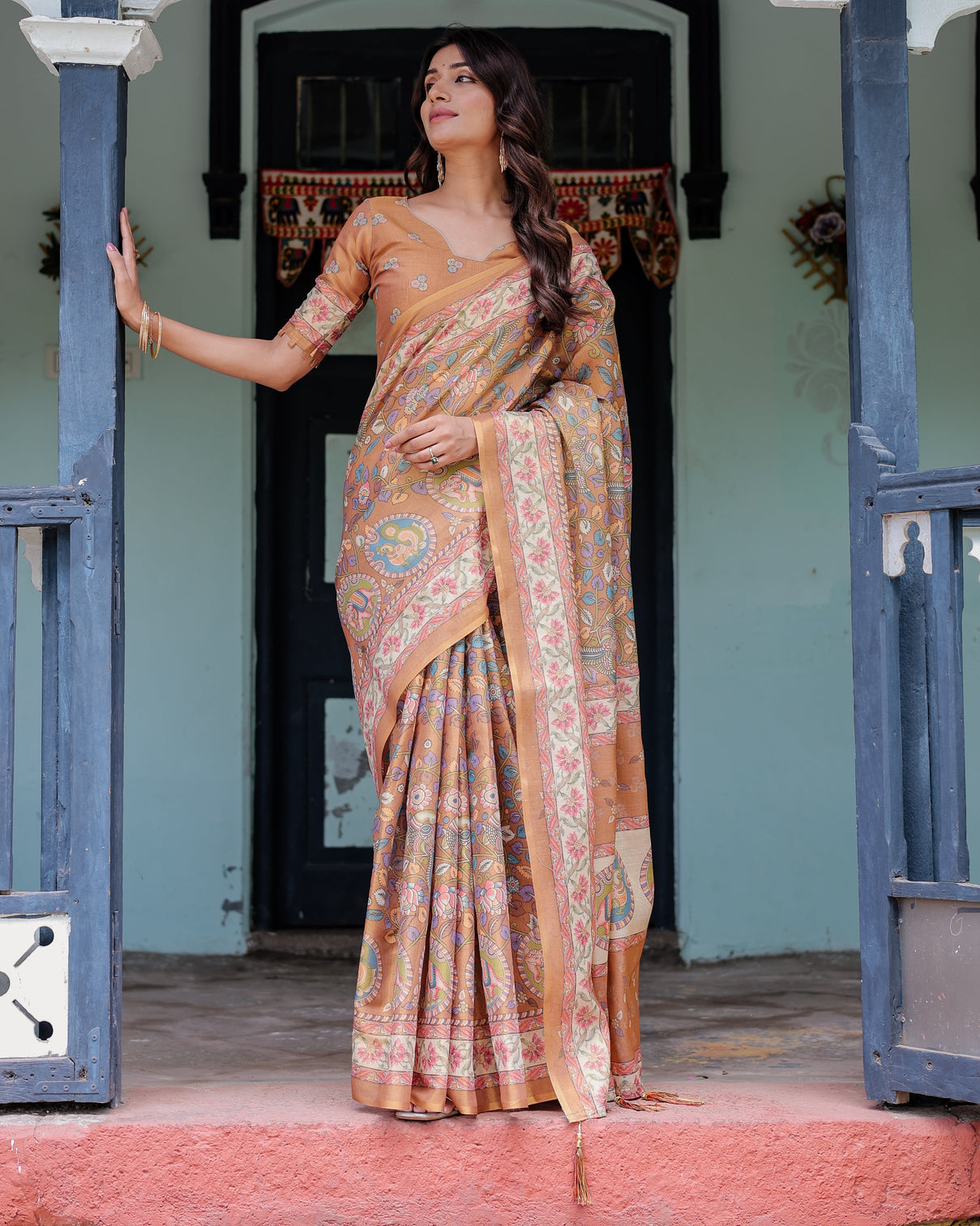Terracotta peach handloom cotton saree with multicolor floral vines kalamkari inspired pallu