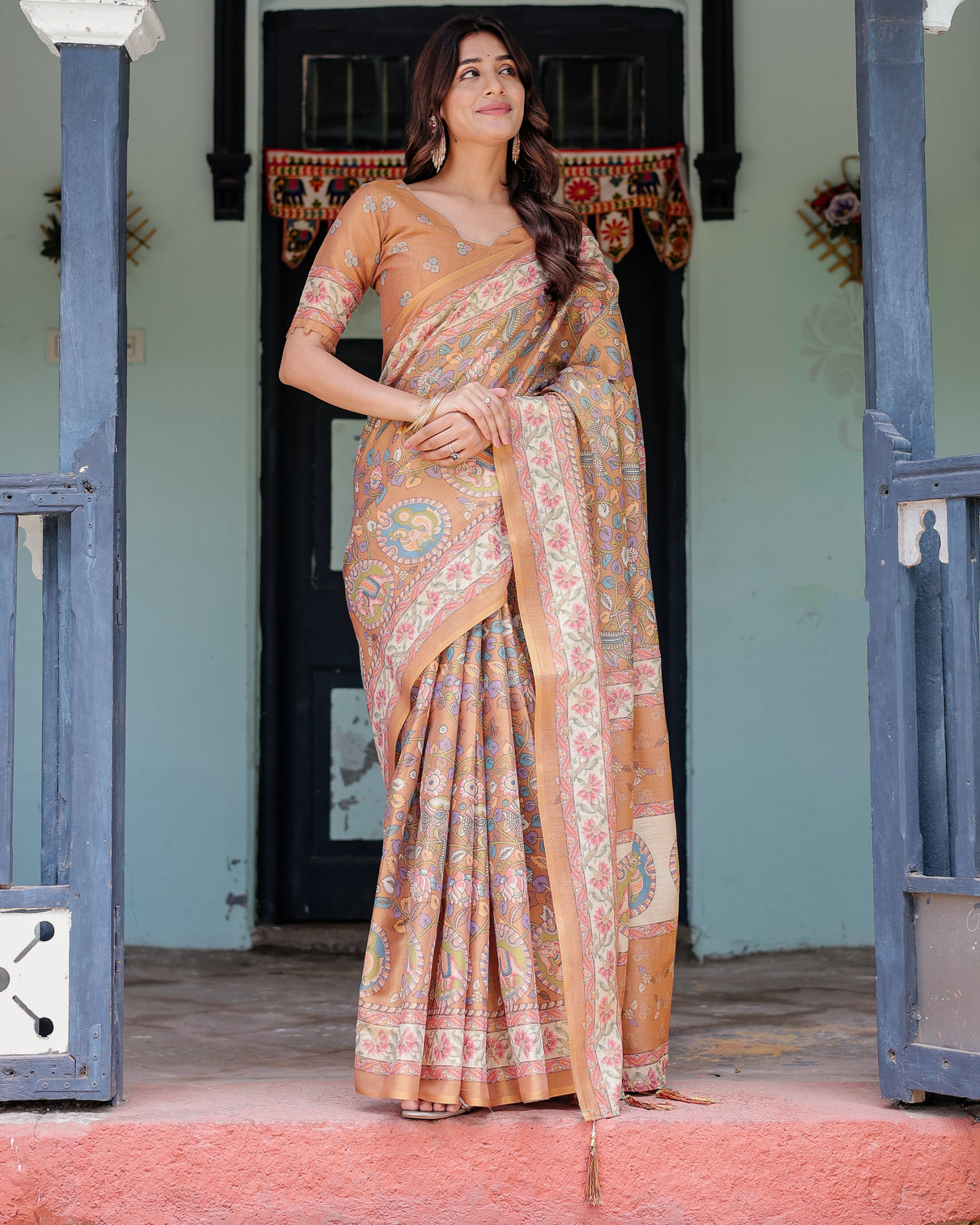 Terracotta peach handloom cotton saree with multicolor floral vines kalamkari inspired pallu