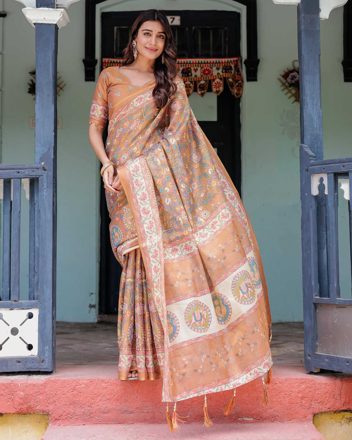 Terracotta peach handloom cotton saree with multicolor floral vines kalamkari inspired pallu