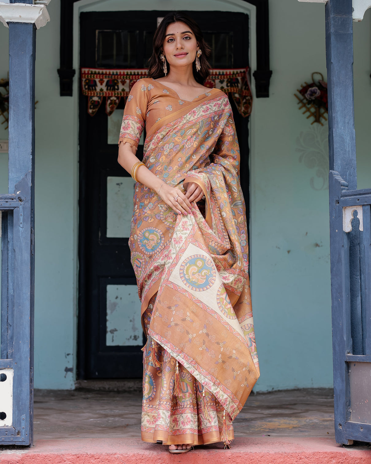 Terracotta peach handloom cotton saree with multicolor floral vines kalamkari inspired pallu