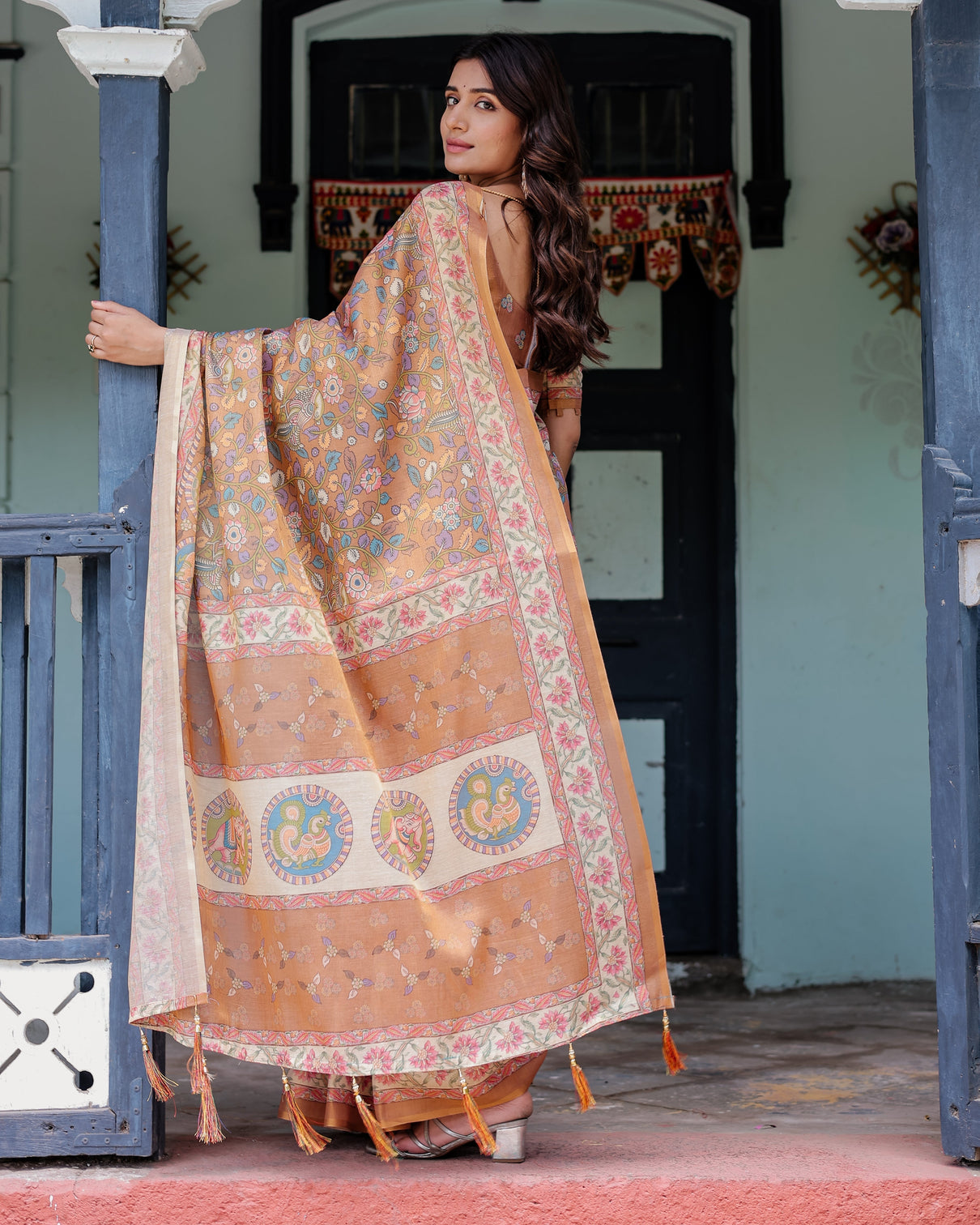 Terracotta peach handloom cotton saree with multicolor floral vines kalamkari inspired pallu