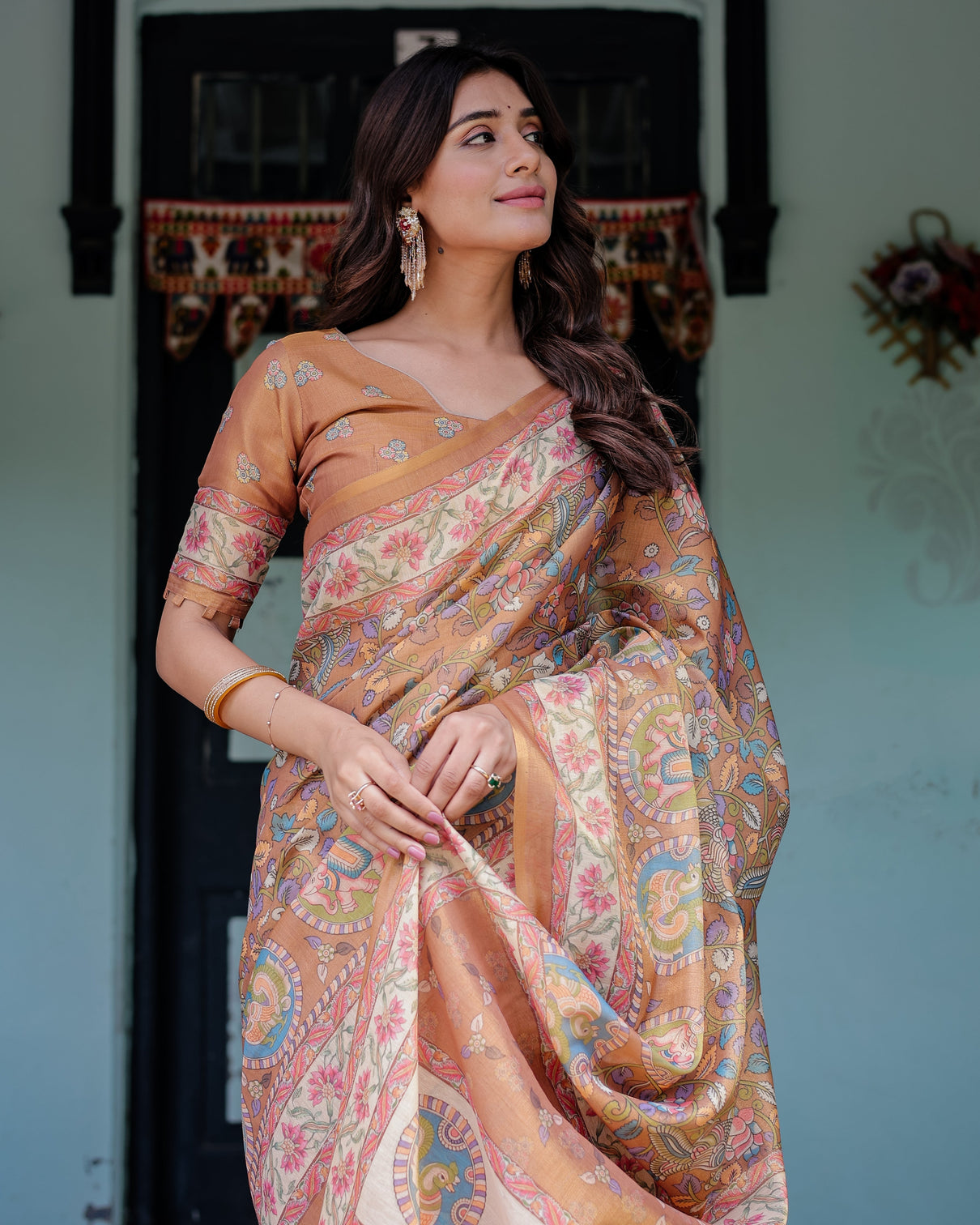 Terracotta peach handloom cotton saree with multicolor floral vines kalamkari inspired pallu