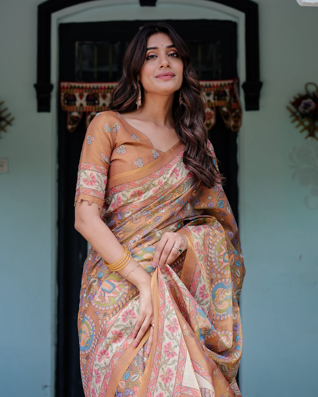 Terracotta peach handloom cotton saree with multicolor floral vines kalamkari inspired pallu