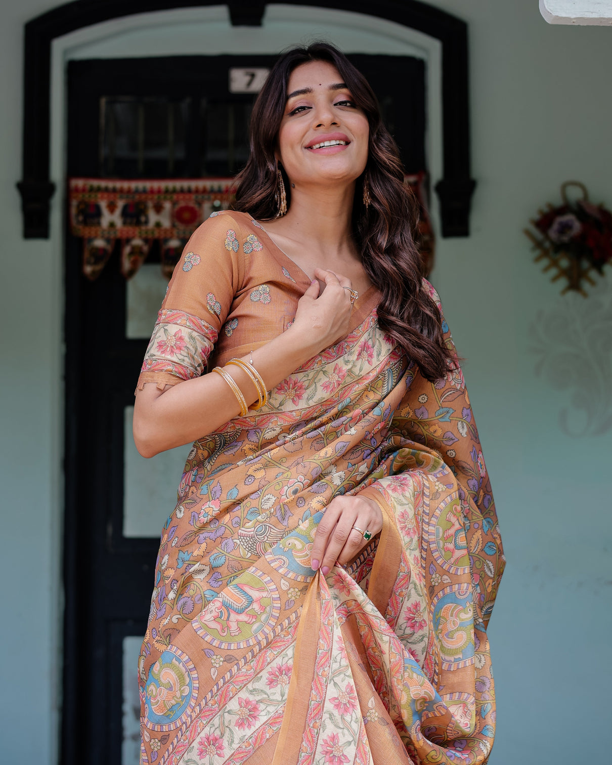 Terracotta peach handloom cotton saree with multicolor floral vines kalamkari inspired pallu