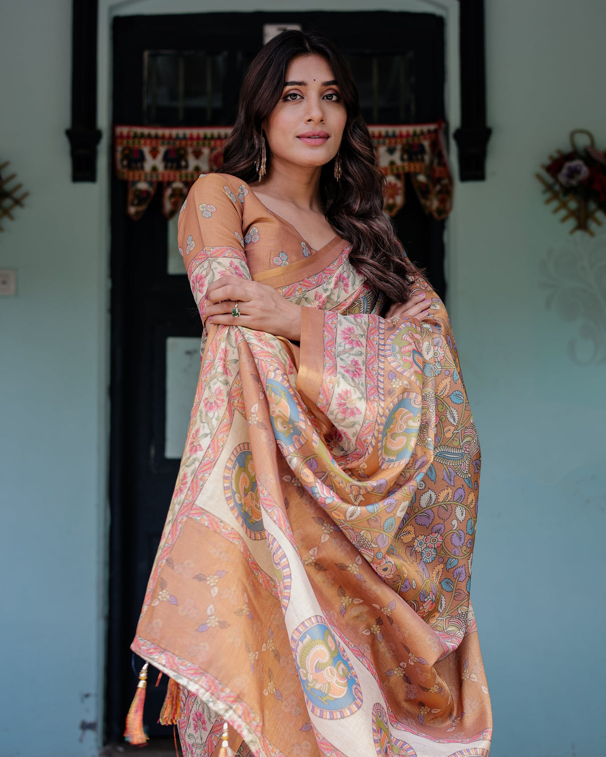 Terracotta peach handloom cotton saree with multicolor floral vines kalamkari inspired pallu