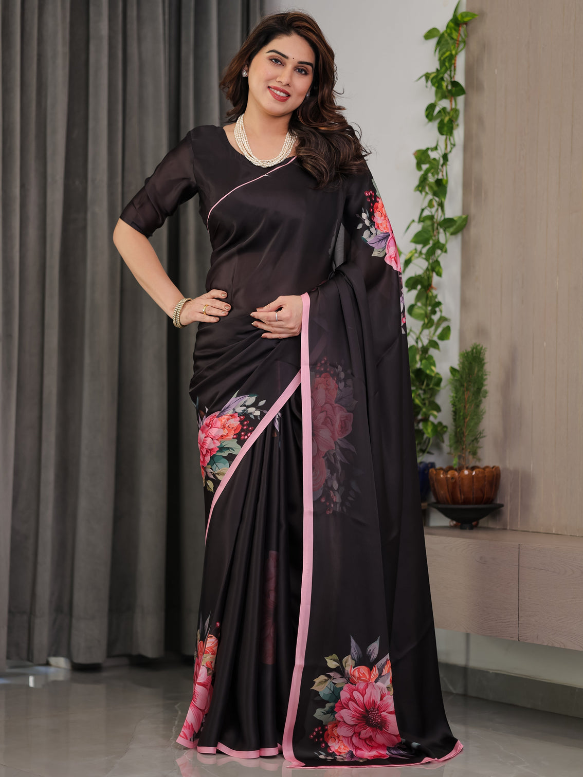 Black satin georgette floral printed saree with soft pink border attached blouse elegant designer partywear drape