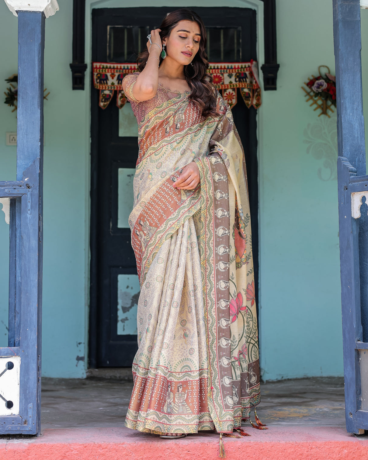 Ivory brown handloom cotton saree with classical dancer motifs madhubani inspired pallu