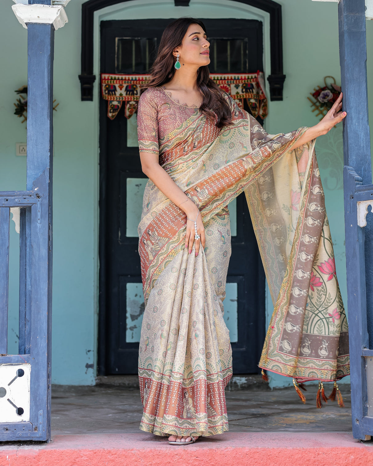 Ivory brown handloom cotton saree with classical dancer motifs madhubani inspired pallu