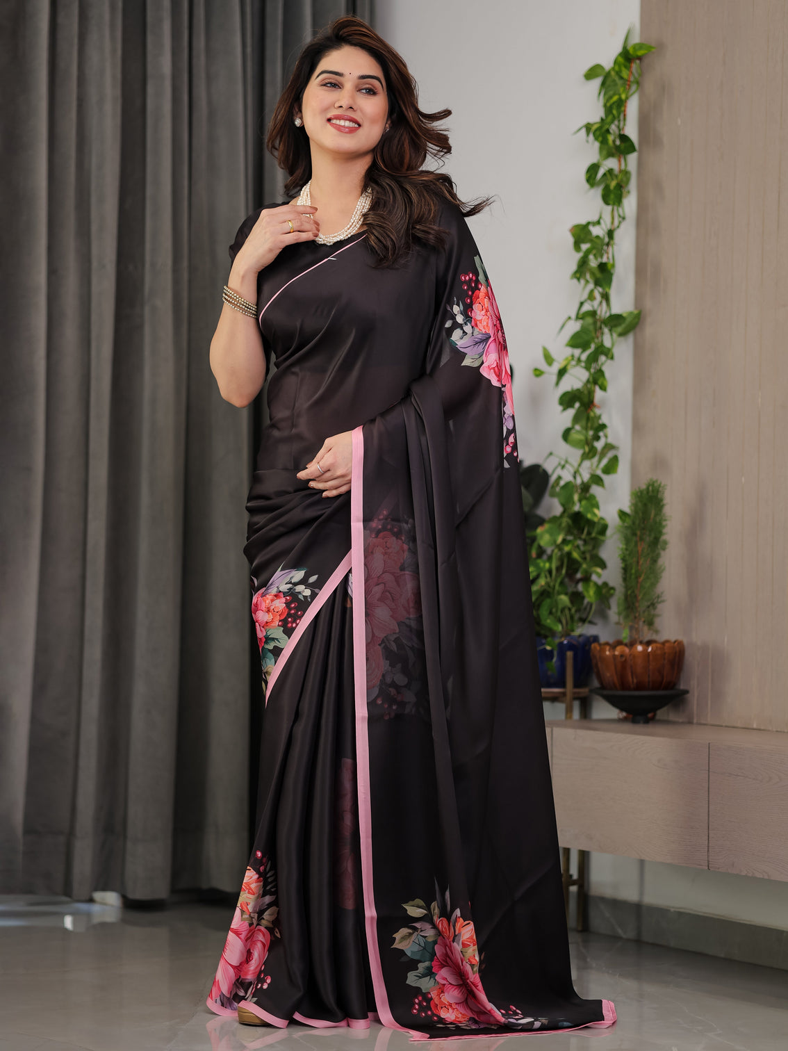 Black satin georgette floral printed saree with soft pink border attached blouse elegant designer partywear drape