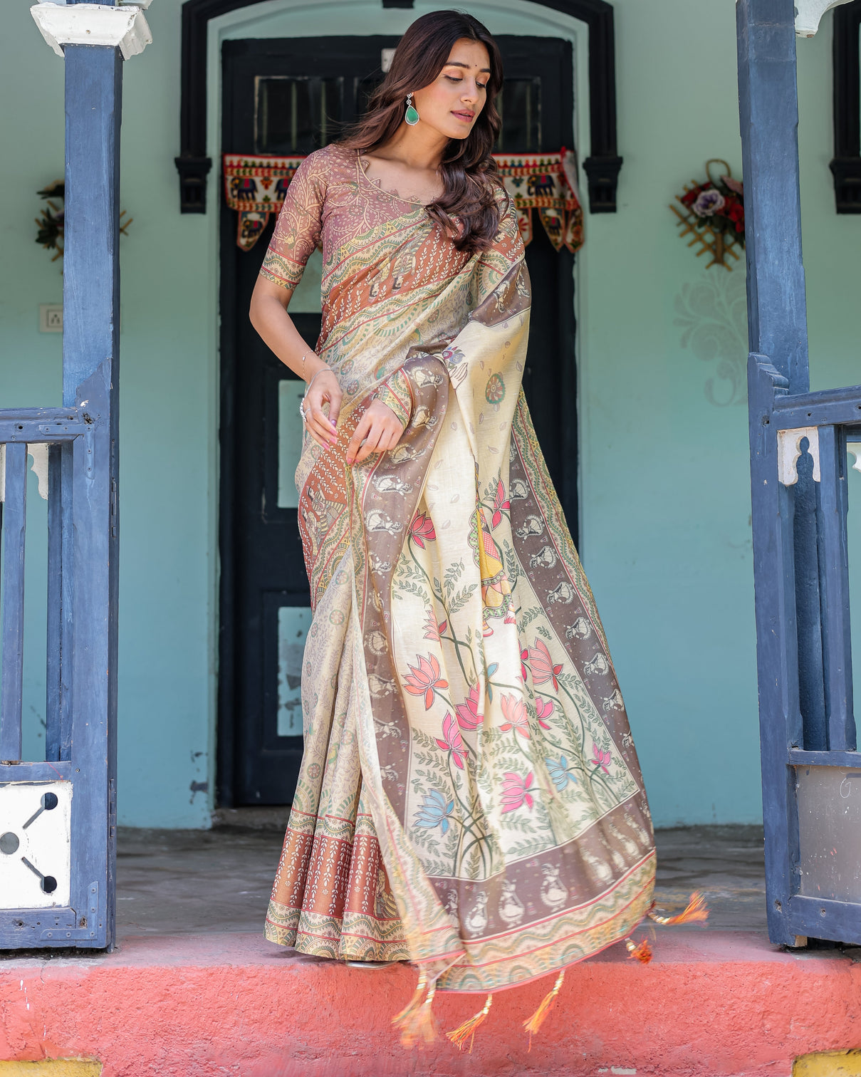 Ivory brown handloom cotton saree with classical dancer motifs madhubani inspired pallu